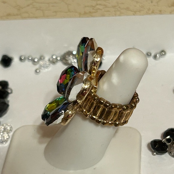 Multi colored crystal flower ring. Adjustable band. - Picture 2 of 3